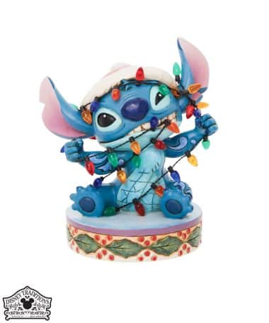 Stitch aggrovigliato fra le luci di Natale - ©Disney TRADITIONS