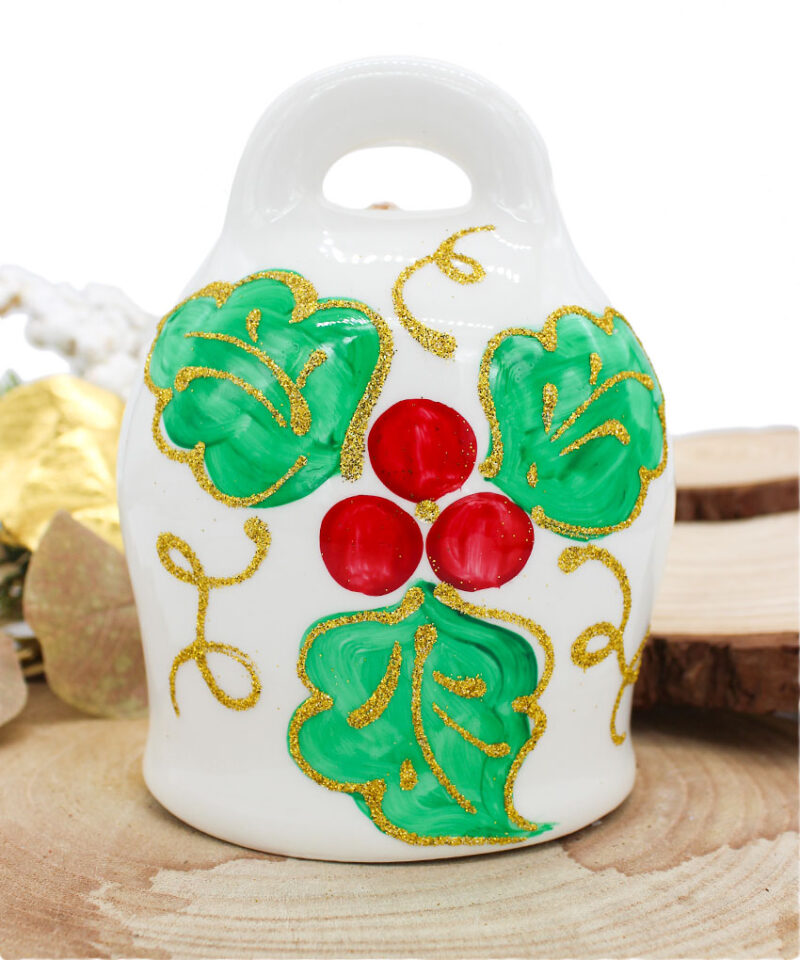 Campana Natalizia in Ceramica di Capodimonte Materiale: Ceramica dipinta a Mano (Made in Italy) Misure: 10cm x 13,5 cm Colore: Bianco - Oro - Verde - Rosso