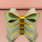 Bomboniera scatola degustazione a forma di fiocco Verde, disponibile in vari colori. Acquistabile con o senza confetti. Perfetta per ogni evento speciale.