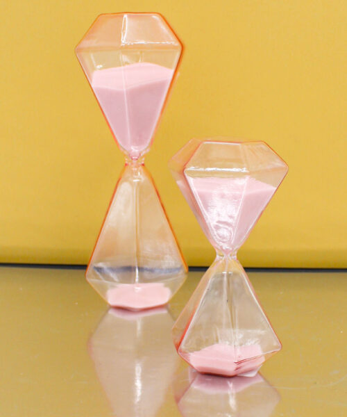 Bomboniera Clessidra Ottagonale Forma Diamante in Vetro Rosa con Sabbia Rosa